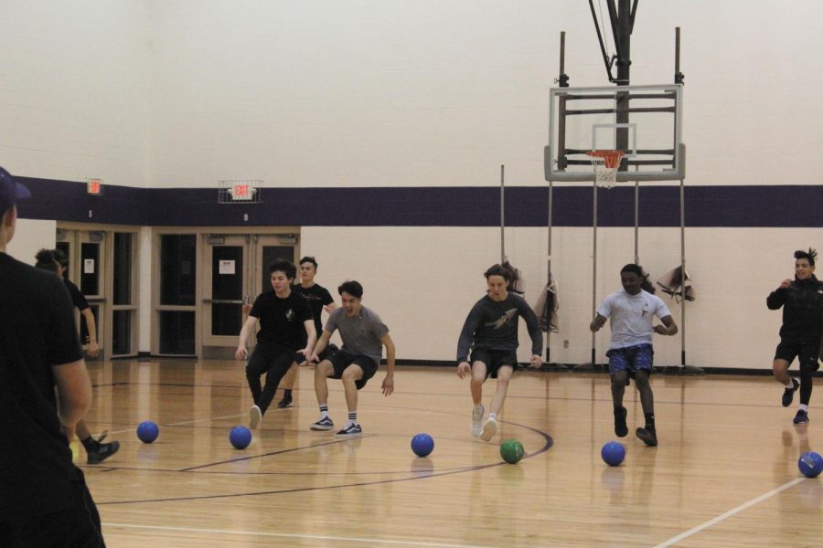 FBLA+hosted+a+dodgeball+tournament+on+Jan.+24+at+East.+Students+on+all+different+teams+competed+to+win.+%E2%80%9CI+was+running+to+go+get+the+balls+for+my+team+in+a+dodgeball+tournament%2C%E2%80%9D+Jason+Bishop+said.