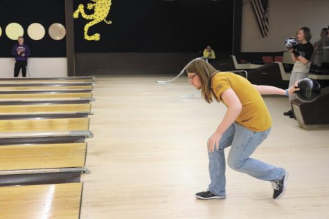 Senior Alec Welte gets into his bowling stance. The unified bowling team practiced Tuesdays after school at Leopard Lanes. “It’s just something I like to do for fun; it isn’t that challenging. I have been doing it for quite a while now,” Welte said. Photo by Cora Bennet