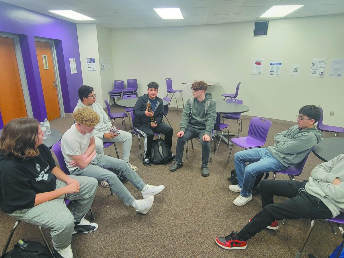 Discussion time. At an Ollin meeting on Dec. 4 (from left) sophomores Samuel Kucinsky, David Baker, Xavier Swotek, Ivan Gomez, and Joel Aguirre discuss the meaning of palabra, meaning “word” in Spanish. Ollin is the young men’s leadership group with the Latino Center of the Midlands. “While these initiatives are framed as leadership development programs, they extend far beyond that.They function as healing circles, offering a secure space for individuals to express themselves [and] share their experiences,” Ollin facilitator José Avalos said.
